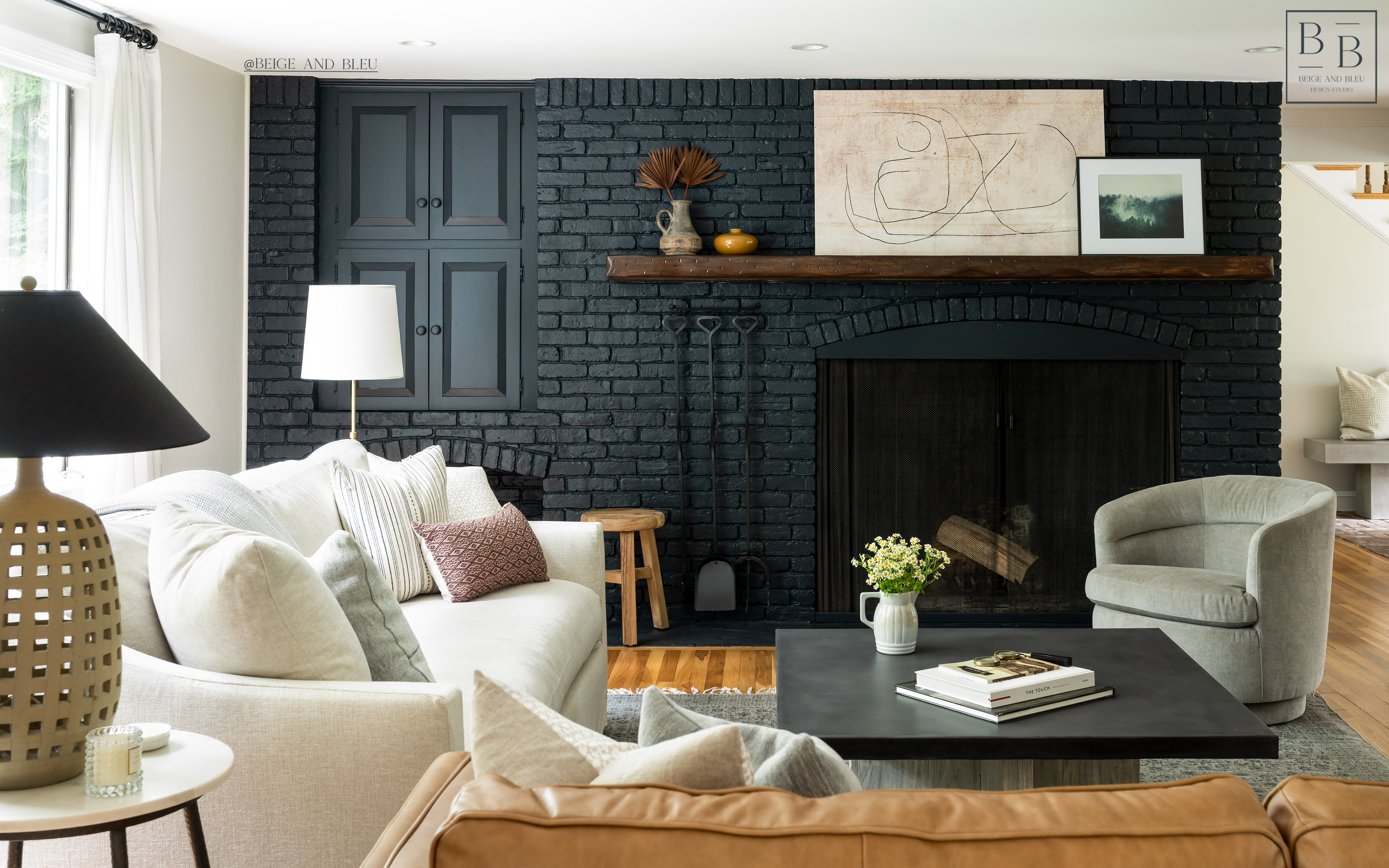 A Black Fireplace with Wall Decorations