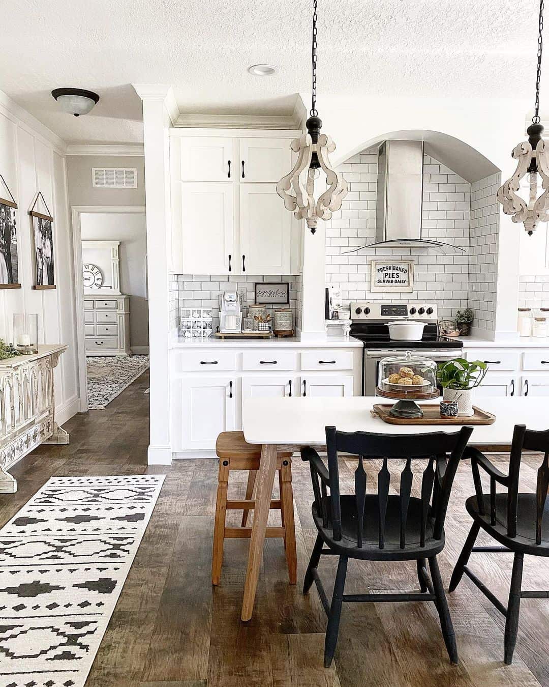 Arched Kitchen Alcove with White Subway Tile Backsplash