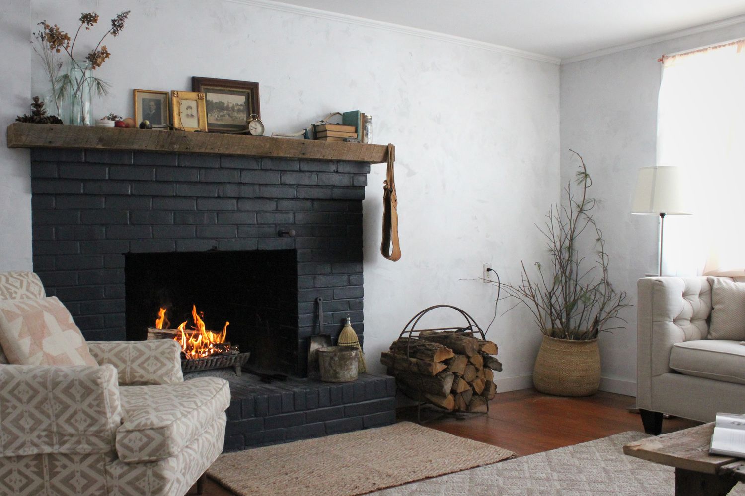Black Brick Fireplace with White Touch