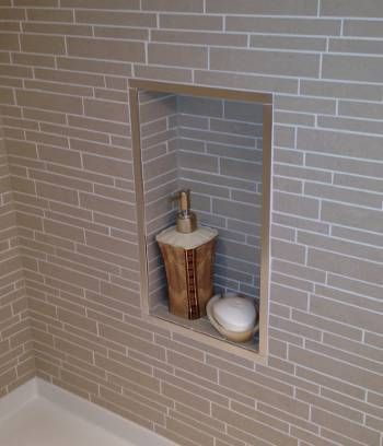 Bling Metal Strip Trim to Set Off Taupe Tile Shower Niche