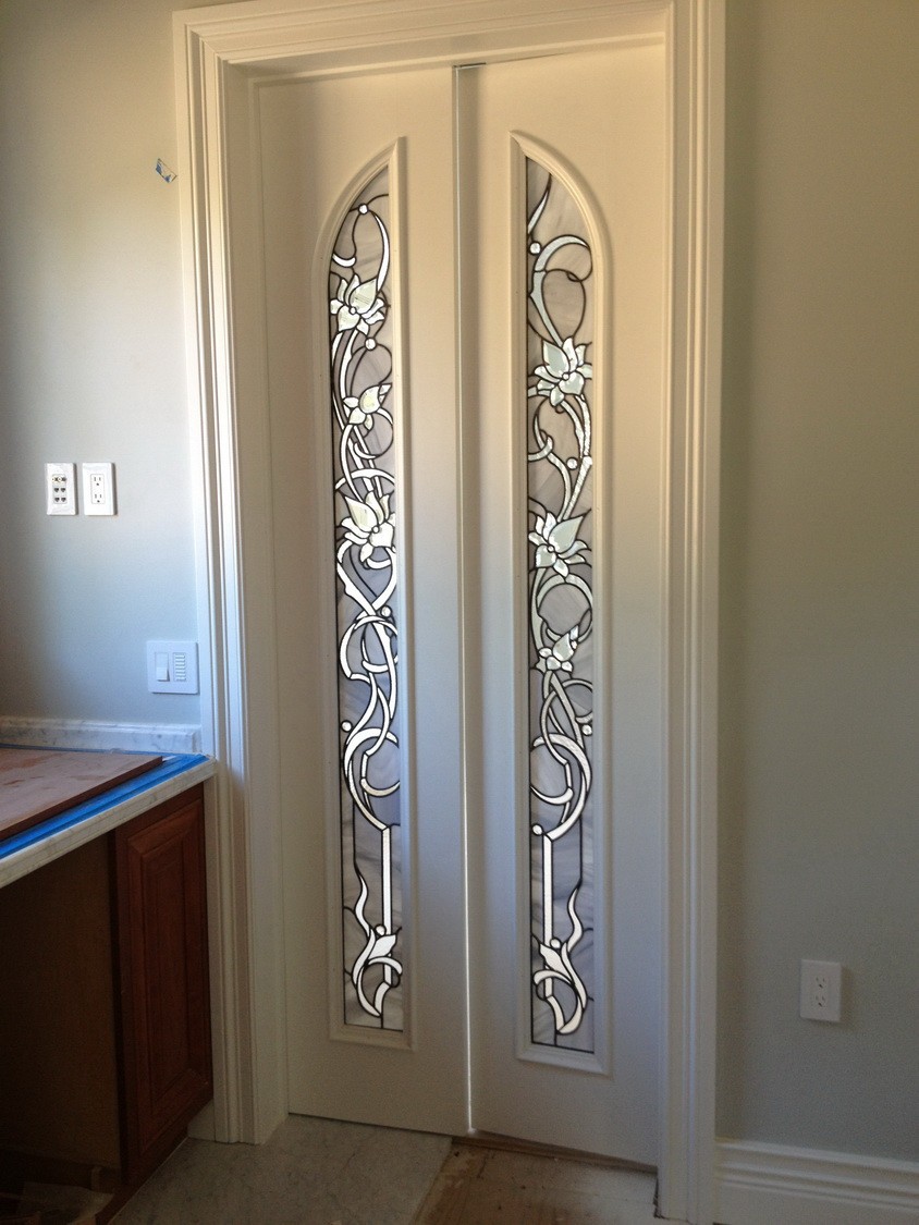 Curved Silver and White Stained Glass Doors