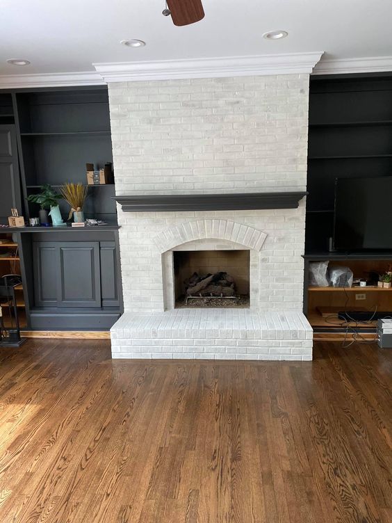Floor-To-Ceiling Brick Fireplace in a Townhouse