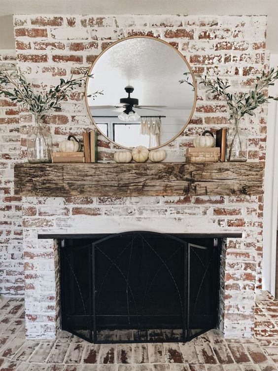 Modern Farmhouse White limewash brick fireplace.