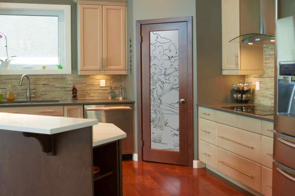 Nature-Themed Etched Glass Set in Wooden Pantry Door