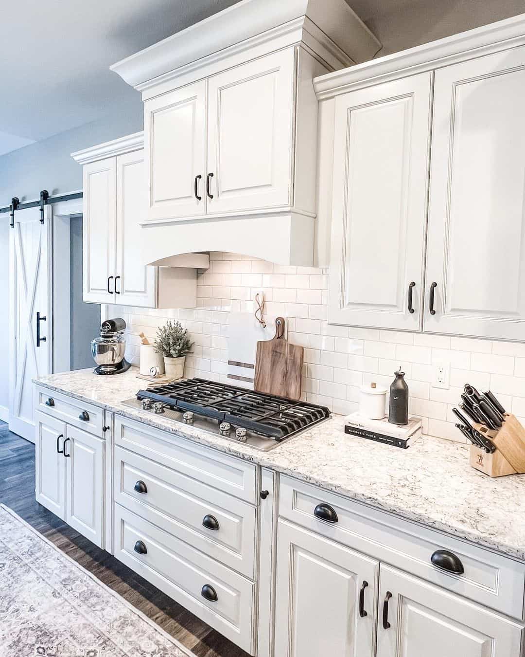 Sliding Barn Doors for a White Kitchen