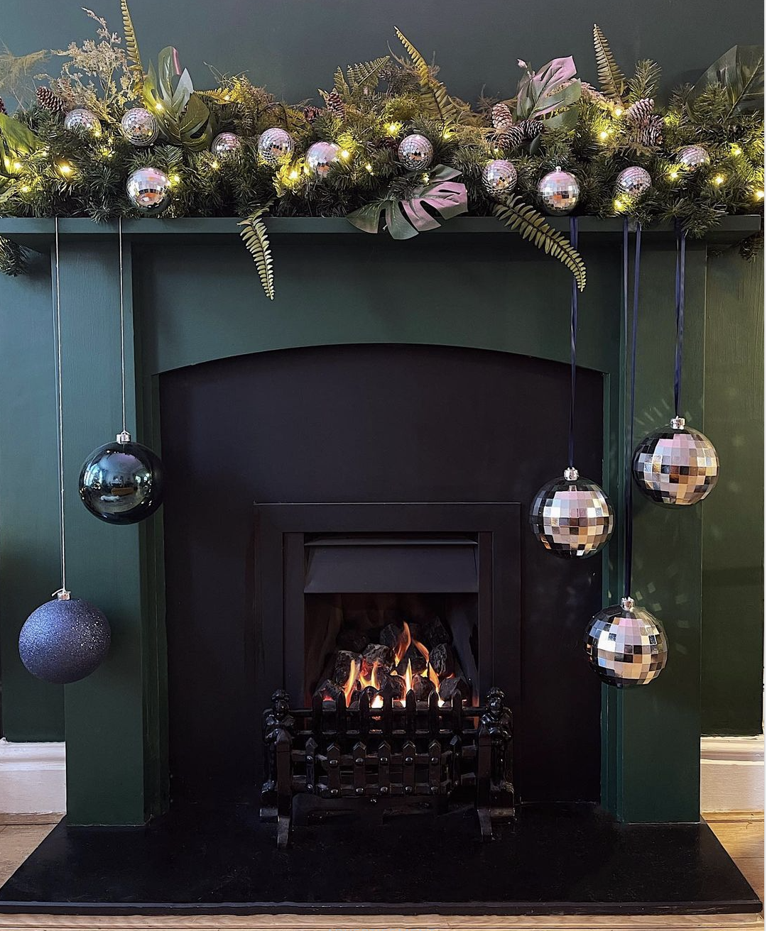 Use the Disco Balls Around the Fireplace