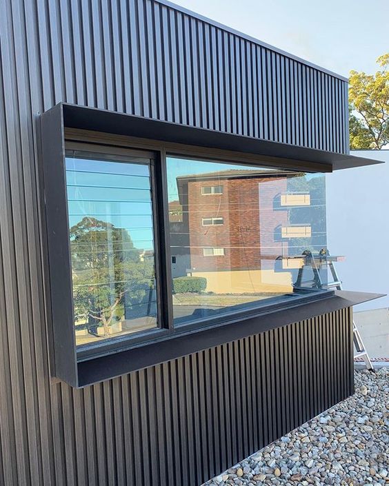 Vertical Black Siding Houses