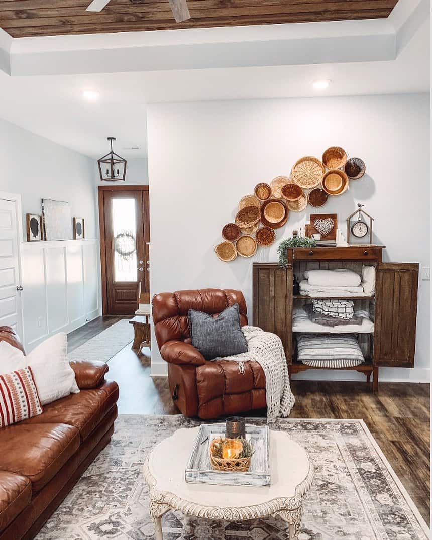 Vintage Farmhouse Living Room with Leather Furniture