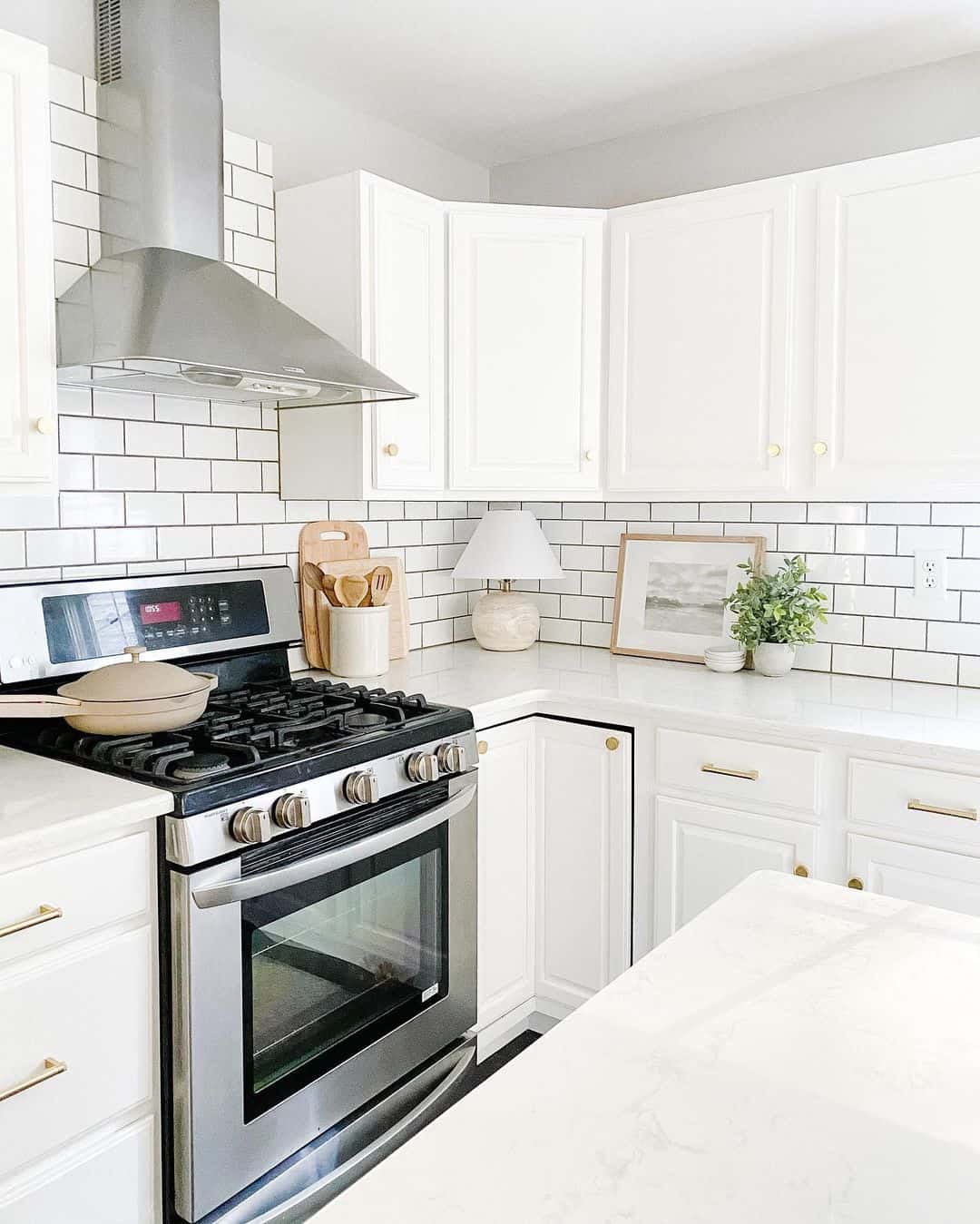 White Kitchen Cabinets and Gold Hardware