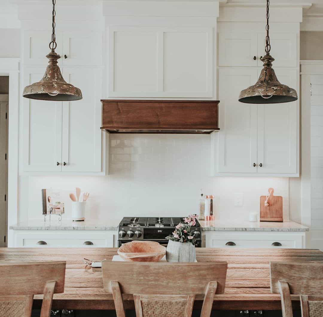 White Subway Tile Backsplash and Wooden Decor