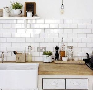 White Subway Tile Kitchen with Wooden Counter Top